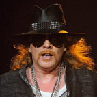 Axl Rose Falls On Stage Again