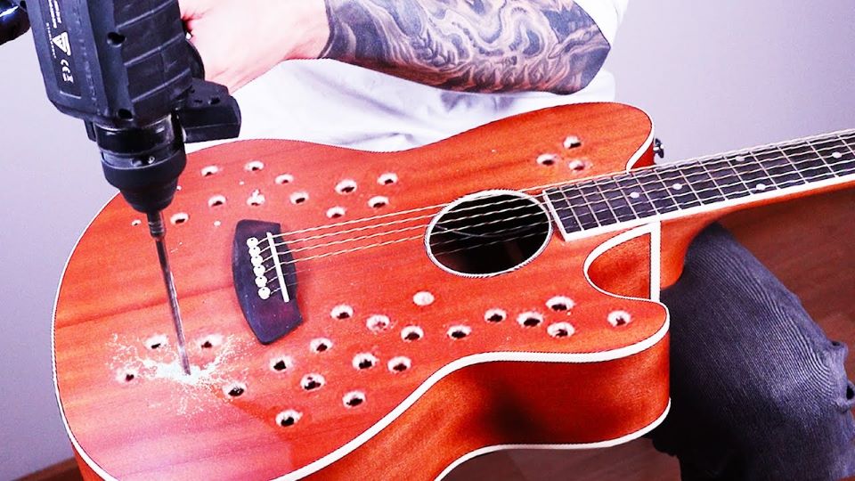 Watch YouTuber Drills Holes on Acoustic Guitar, This Is How It Sounded