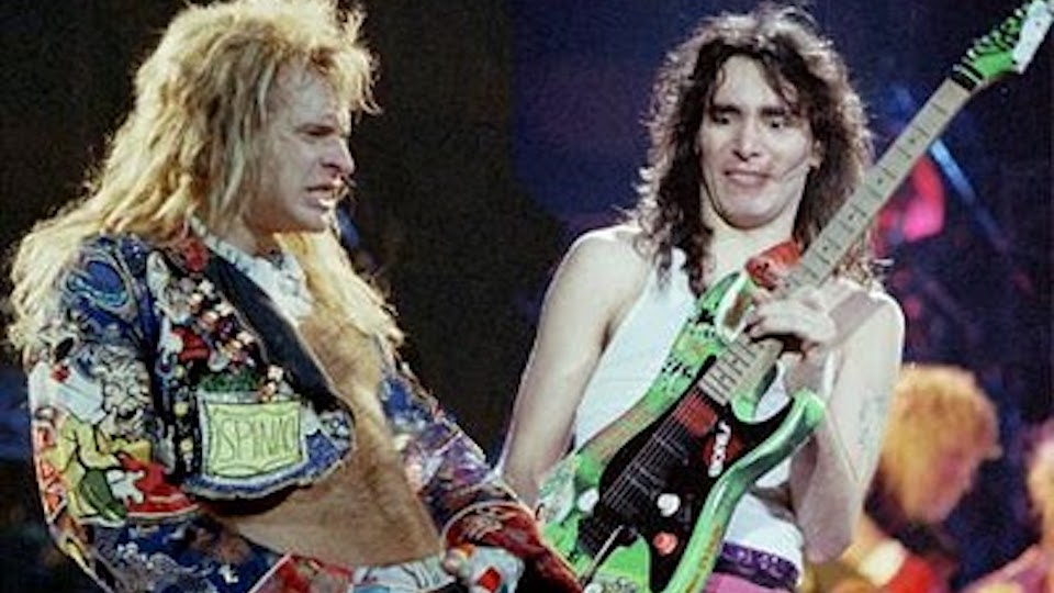Steve Vai Remembers Debauchery While Being in David Lee Roth's Band: 'I Was  in a Relationship, I Wasn't Promiscuous' | Music News @ 