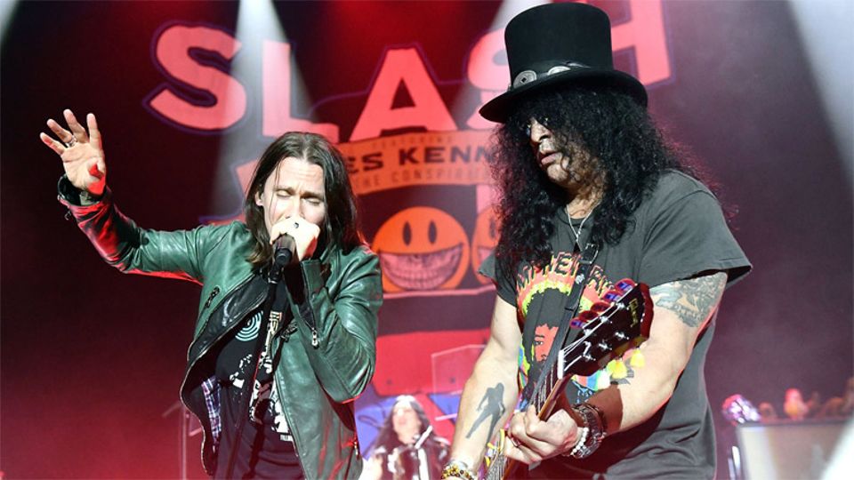 A slash that bisects the world itself. Myles kennedy. slash miles kennedy riser is rising. slash watches. conspirator.