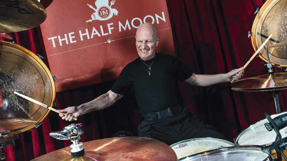 AC/DC Drummer Chris Slade Reveals Secret to Rocking Drums Hard at Age