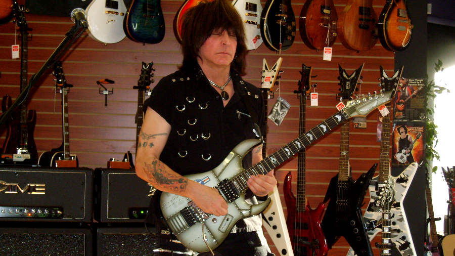 Michael Angelo: How Being Left-Handed & Playing Guitar in Right-Handed Position Shaped My Style